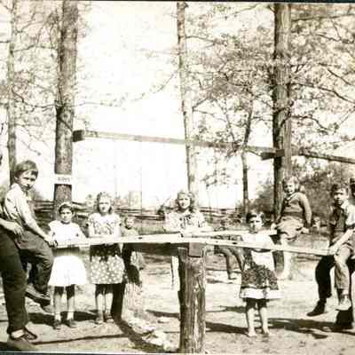 Children on a seesaw