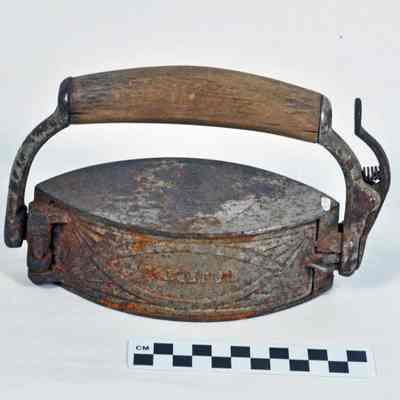 Flat iron with wooden handle