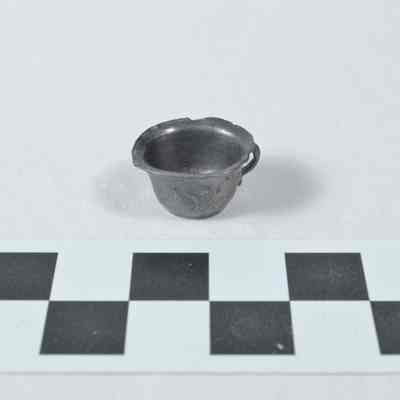 Pewter cup with floral design