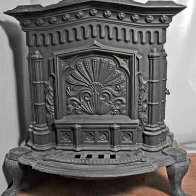 Rectangular, black, cast iron parlor stove