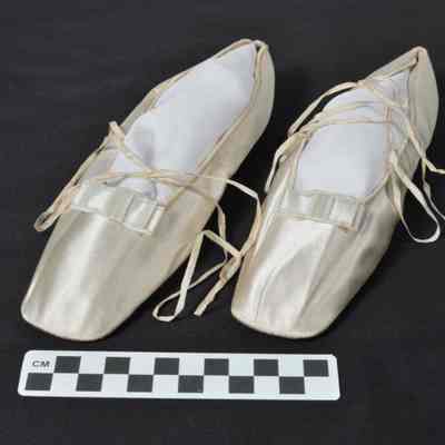 Light cream colored silk ballroom slippers