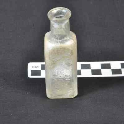 Clear glass rectangular pharmacy bottle