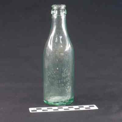 Green glass beverage bottle
