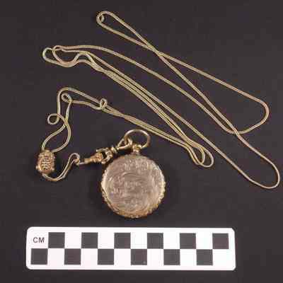 Gold-filled locket with two images inside