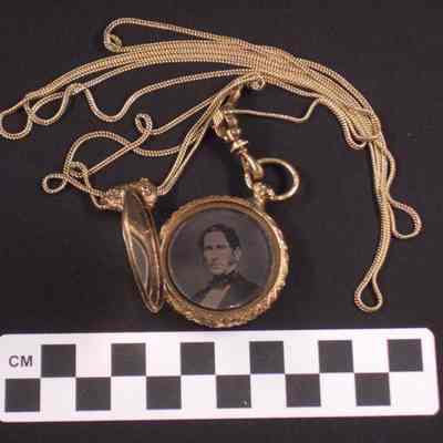 Gold-filled locket with two images inside