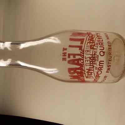 20th century clear glass milk bottle