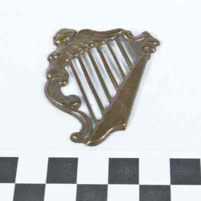Stamped brass 1860 69th New York hat badge