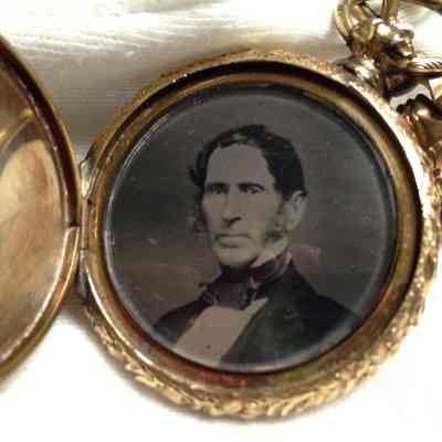 Gold-filled locket with two images inside