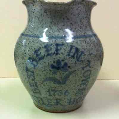 Gray, stoneware pitcher made by Sycamore Pottery