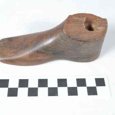 Small, wooden shoe last for child's shoe