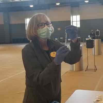 Resident Nurse preparing COVID-19 vaccination at Shepherd University