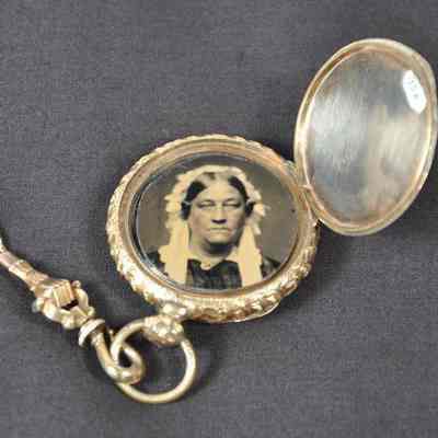 Gold-filled locket with two images inside