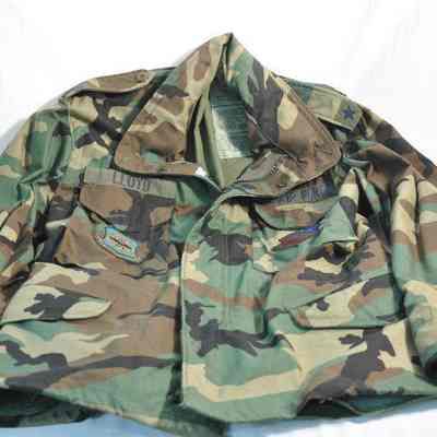 Green, black, brown and beige jungle camouflage cold weather field jacket