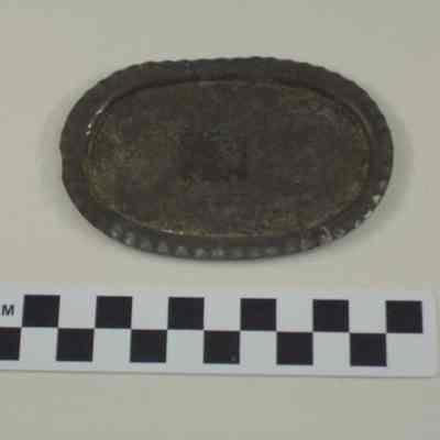 Doll's pewter tray with scalloped edges