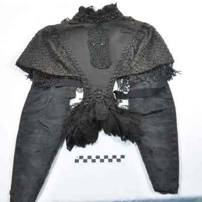 Black twill cape trimmed with lace and jet beads