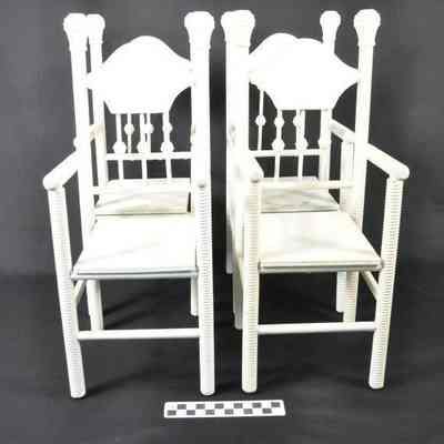 Four white painted straight chairs for a doll