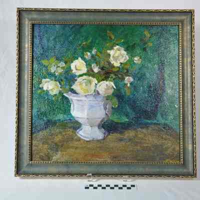 Still life of white roses in a white bowl