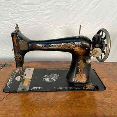 Singer Manufacturing Co. treadle sewing machine and Westinghouse Electric & Mfg. Co. motor