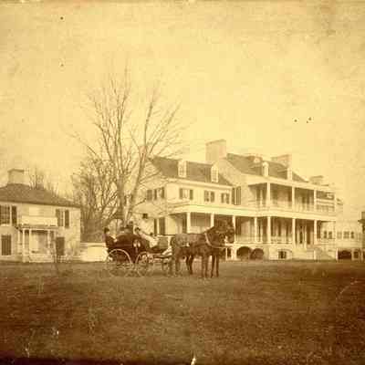 Claymont Court, five men in a carriage