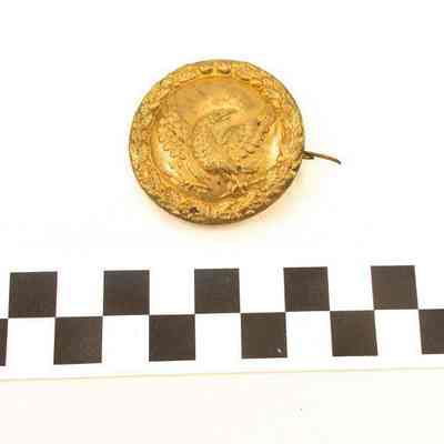 Mexican-War era round stamped brass hat badge