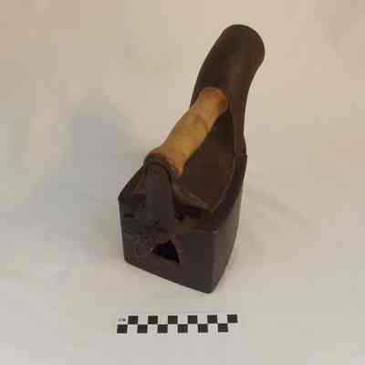 Charcoal iron with large spout or chimney