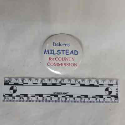 Delores Milstead campaign button