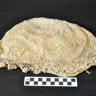 Fine crocheted Juliet cap over silk