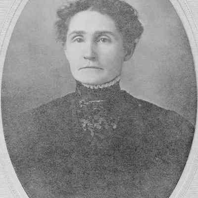 Woman in high collar dress