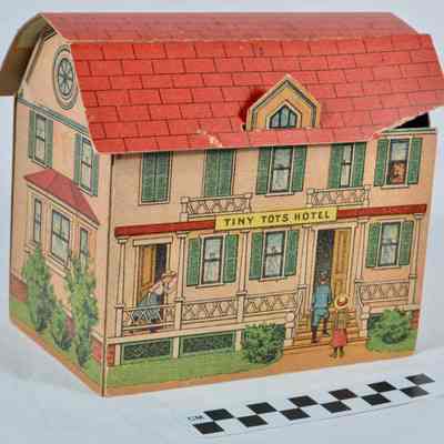 Cardboard dollhouse, entitled "Tiny Tots Hotel"