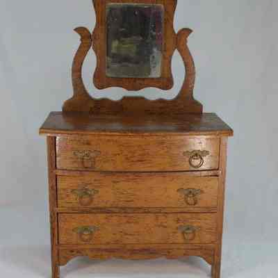 Three drawer wooden doll dresser