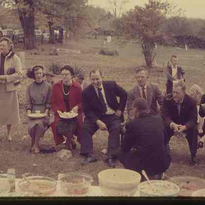 Individuals sitting in chairs outside Uvilla Methodist Church (IMG3895003)