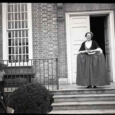 Docent standing on steps at unknown museum