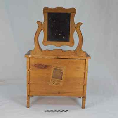 Three drawer wooden doll dresser