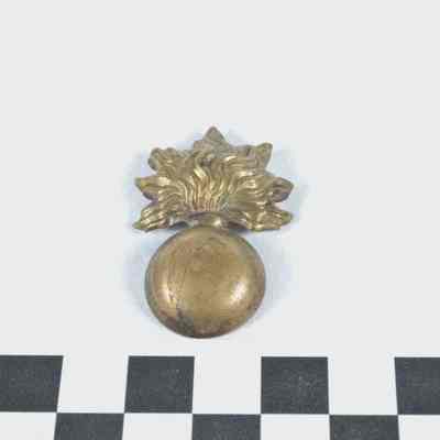 Stamped brass ordnance badge