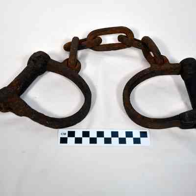 Iron leg restraints