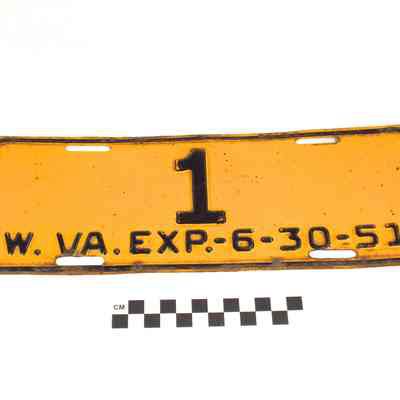 Yellow West Virginia license plate with black digits