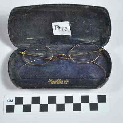Gold, very thin wire-rimmed glasses