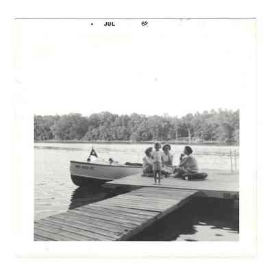 Boat docked on the Potomac River at "Allen's Wonderland." In front, Traci Welsh-Taylor. Back L-R: Dorothy "Dor" Webb Welsh, Lois Jean Stickley Welsh, June D. Eaton Welsh: IMG2025.026.001 (15)