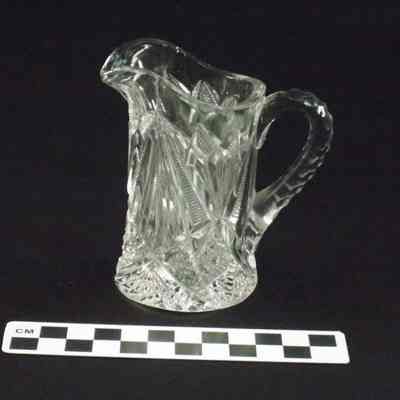 Clear glass pitcher made for child's play