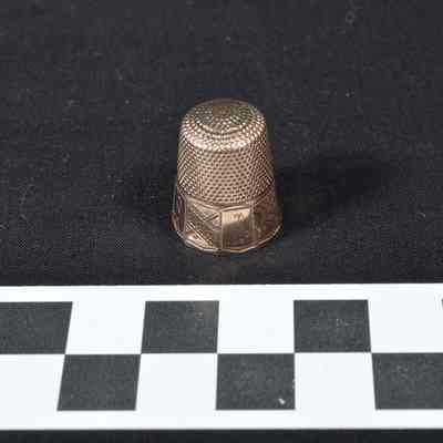 Tapered gold thimble