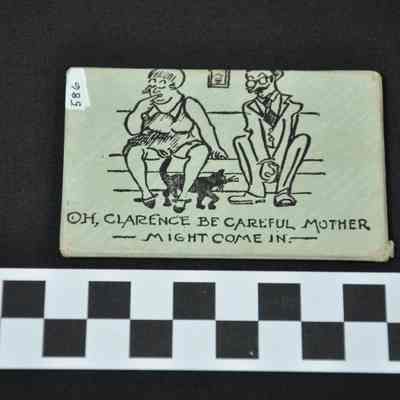 Small pocket-sized mirror with cartoon on the reverse side