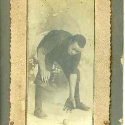 Unidentified African American man playing baseball