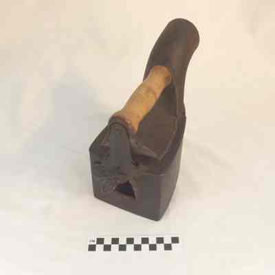 Charcoal iron with large spout or chimney