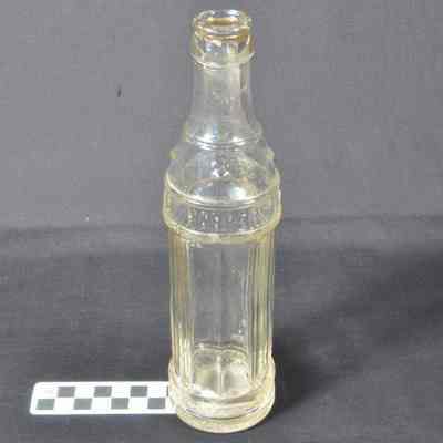 Clear glass beverage bottle