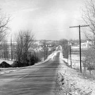 Halltown dynamite truck explosion - view of repaired hole in road