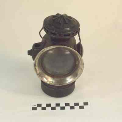 Small black railroad lantern