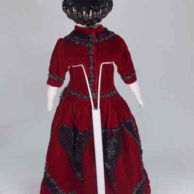 China doll with red velvet dress