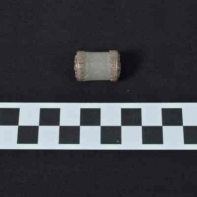 Wax cylinder with 2 silver end caps with raised flower design