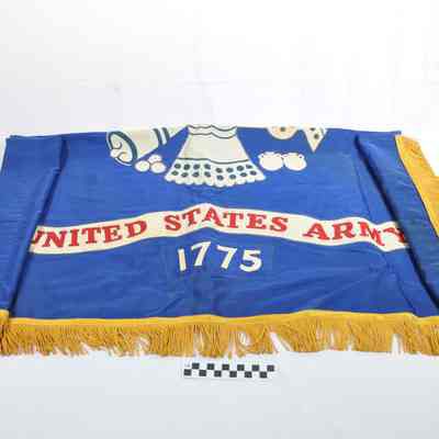 Blue satin flag with gold fringe