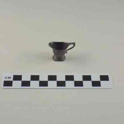 Doll's pewter water pitcher